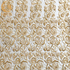 Το χρυσό Tulle που κεντήθηκε διακόσμησε το βαρύ χειροποίητο ύφασμα δαντελλών για τα φορέματα με χάντρες