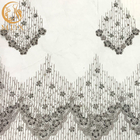 Γκρίζο διακοσμημένο με χάντρες ύφασμα δαντελλών διακοσμήσεων χειροποίητο για το φόρεμα βραδιού